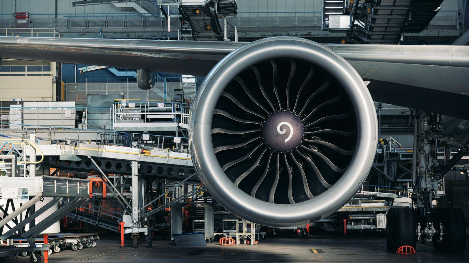 Engine on wing in a maintenance hangar
